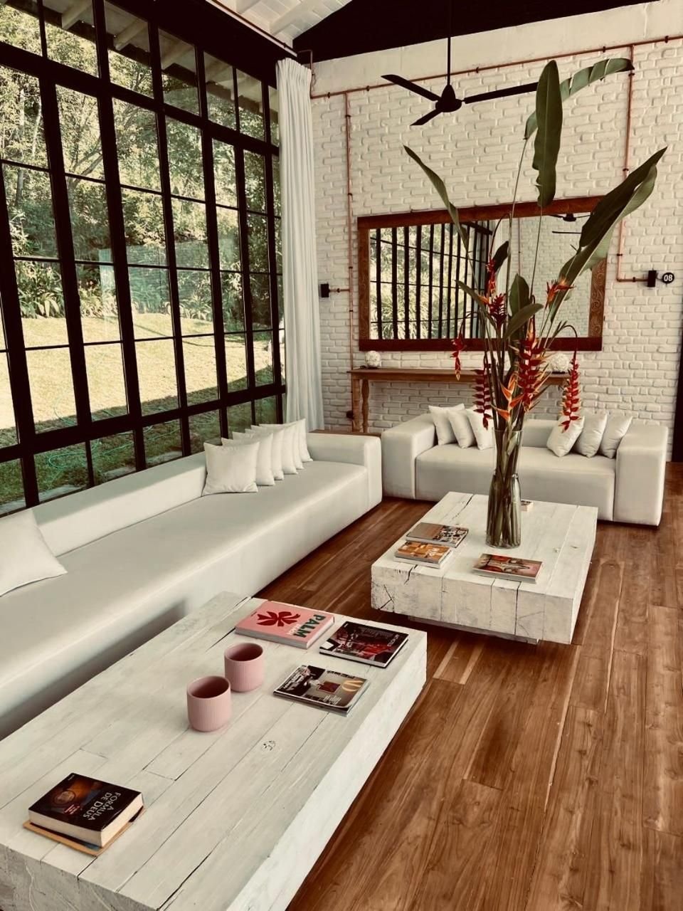 Family Studio Loft: A duplex loft with a double-height living room, a private garden veranda and room for four.