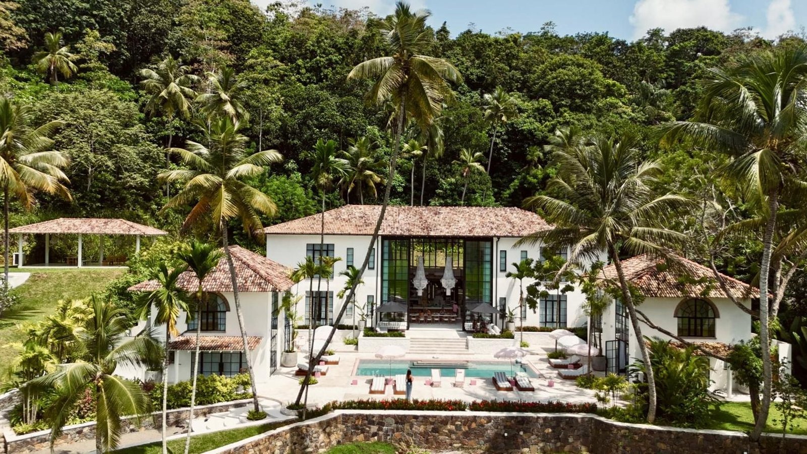 Miss Ceylon’s white colonial lofts, infinity pool and tropical grounds