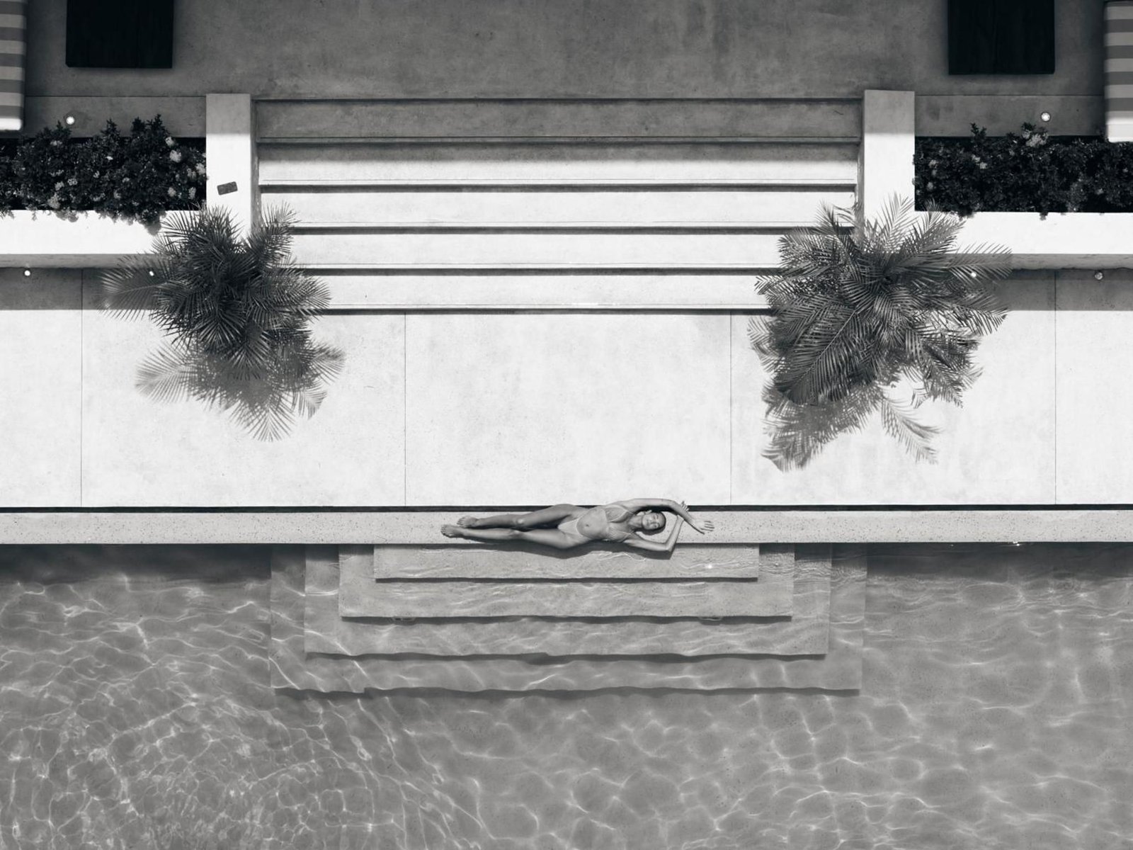 Black and white view of the pool steps from above
